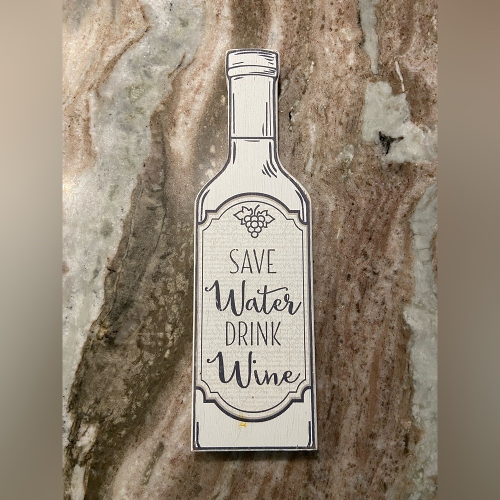 Gray and White Decorative Accent Bottle Sign